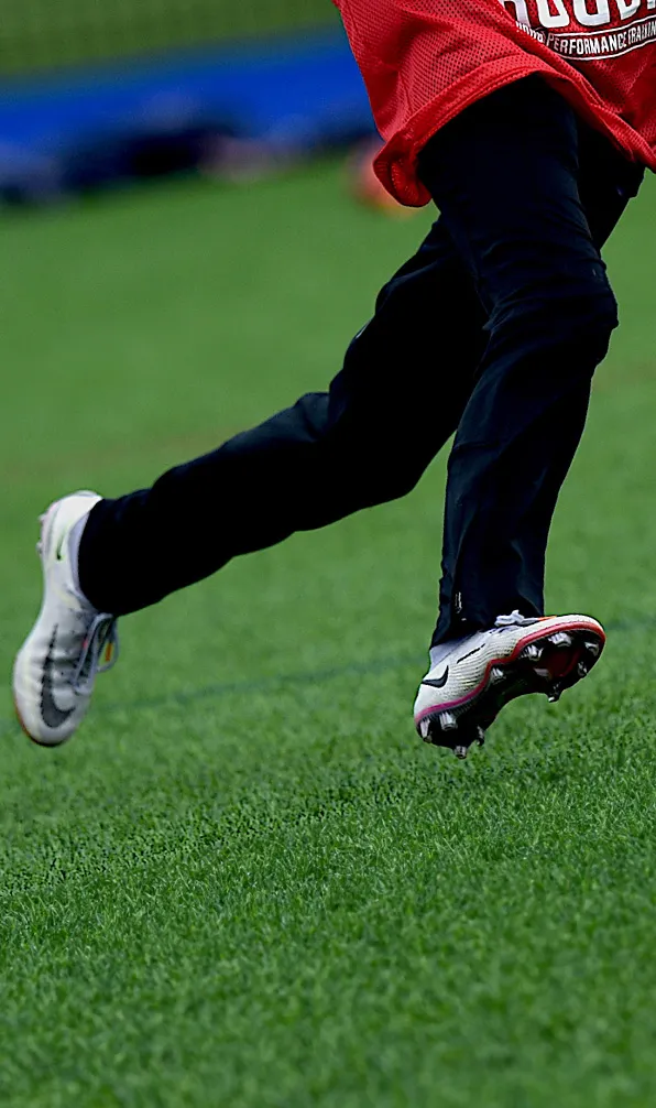 Kids Bottoms & Trousers A young rugby player running on the pitch wearing training pants