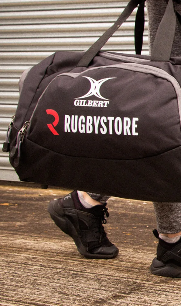 Luggage Gilbert Rugbystore holdall being carried to training