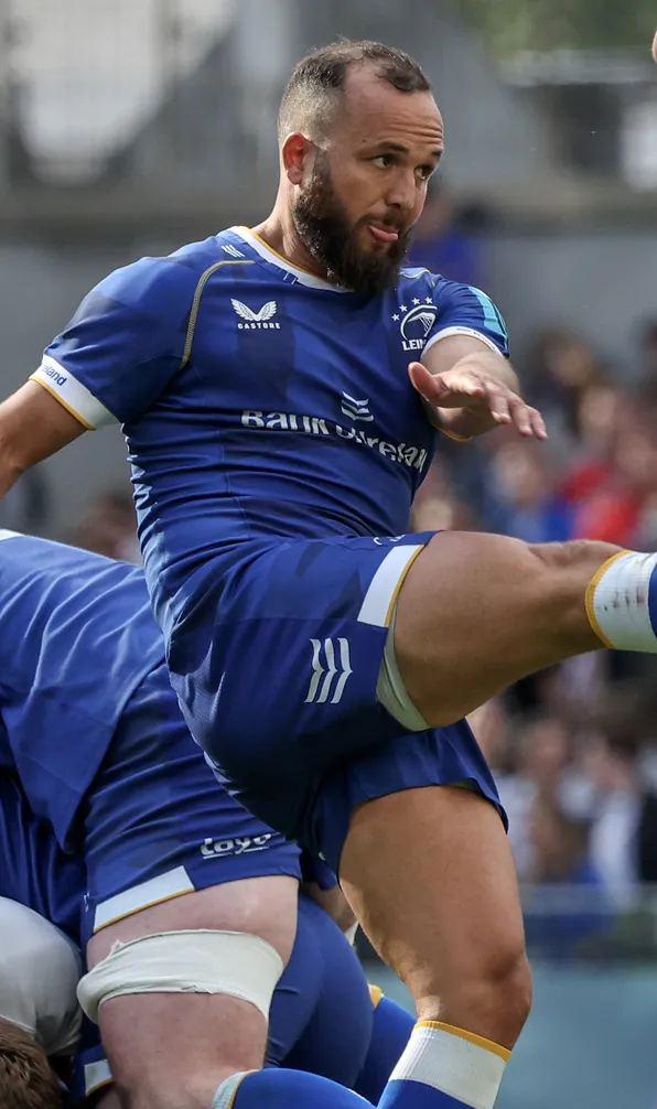 Leinster Rugby Leinster rugby player kicks the ball upfield during a rugby match