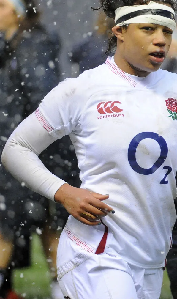 Womens Base Layers & Compression Female England rugby player keeping warm wearing a base layer under her rugby shirt