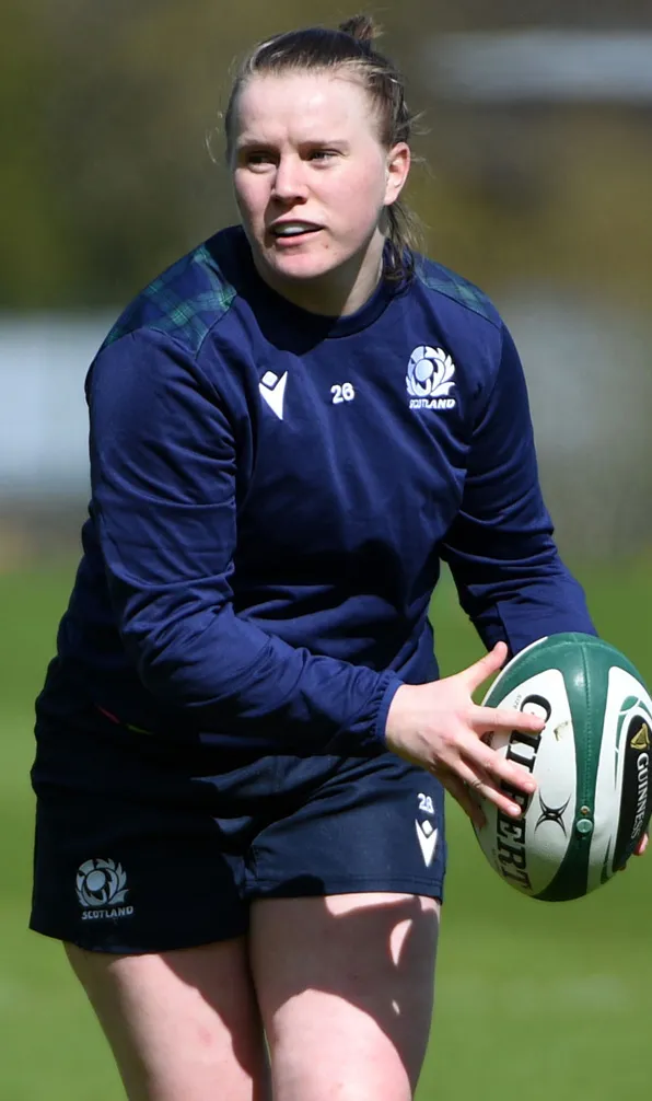 Womens Hoodies & Sweatshirts Female rugby player focuses on her passing during a training session