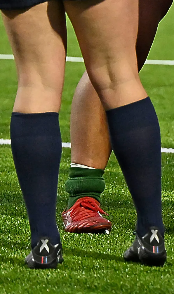 Womens Rugby Socks Female rugby players compare socks during a game