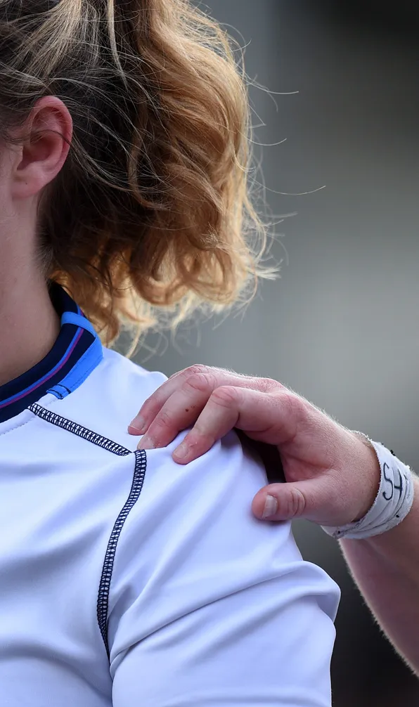 Womens Rugby Shoulder Pads Women rugby players supporting each other wearing shoulder pads