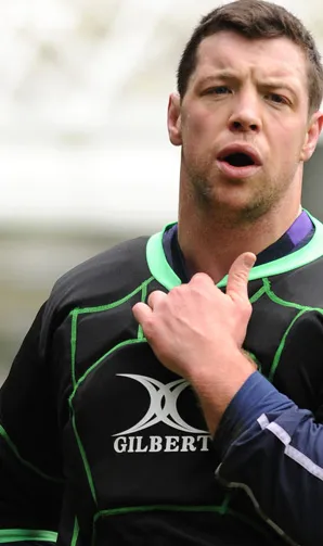 Rugby player wearing Gilbert body armour during a training session
