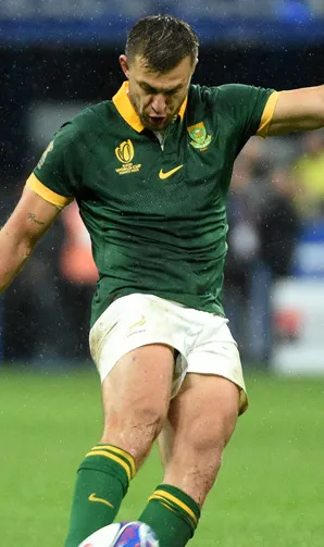 South Africa Springboks Rugby South African player takes a kick during a very wet World Cup match