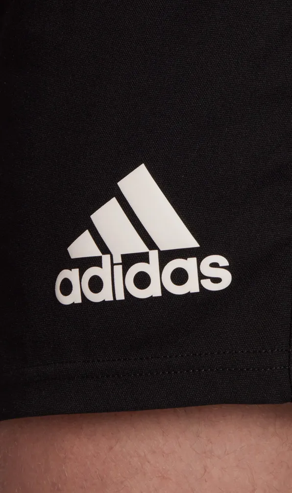 Adidas Rugby Teamwear A rugby player wearing black Adidas rugby shorts showing the brand logo