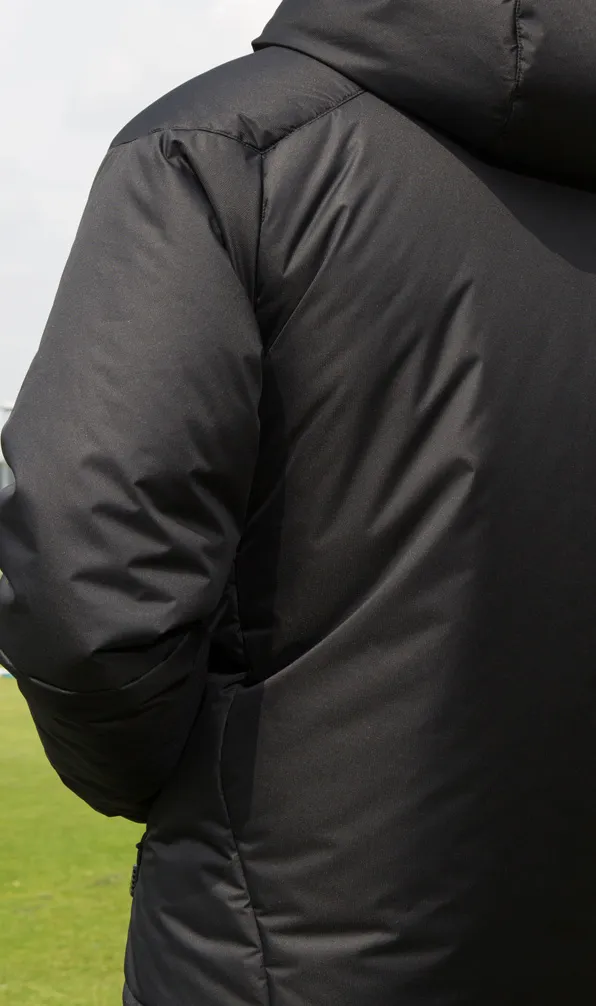 Teamwear Rugby Jackets The back of a rugby teamwear jacket being worn beside the pitch on a cold training day