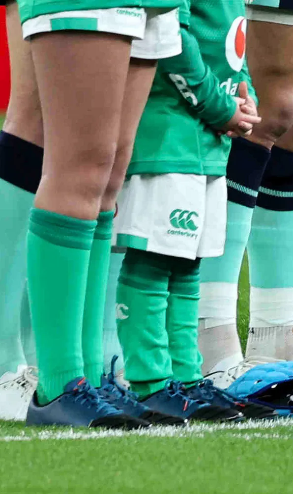 Kids Rugby Boots A young Irish mascot on pitch during the national anthem wearing the same boots as they're idols