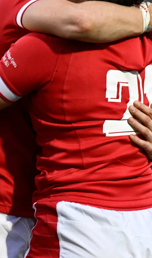 Womens Clearance Shop by Size Two female Wales rugby players celebrate a victory during the Womens 6 Nations tournament