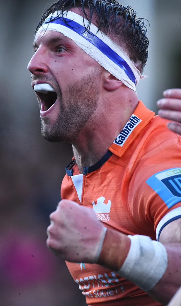 Edinburgh Player celebrates and cheers during URC Match