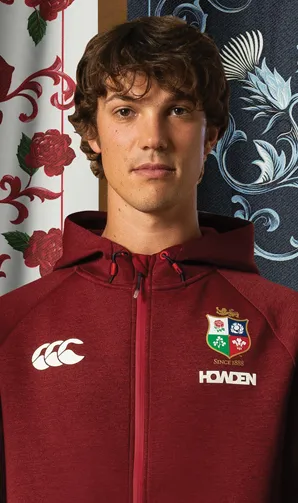 Shop British & Irish Lions Now Rugby Player wearing British & Irish Lions 2025 Hoodie