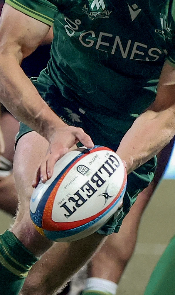 Rugby Balls Clearance A rugby players gets ready to pass a rugby ball