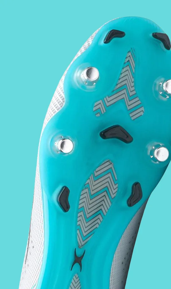 Soleplate of a Gilbert boot on a blue background