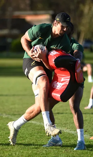 Training Blog South Africa players using a tackle pad during training session