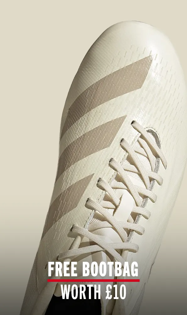 Shop Adidas Boots Now Top view of an Adidas boot on an off-white background