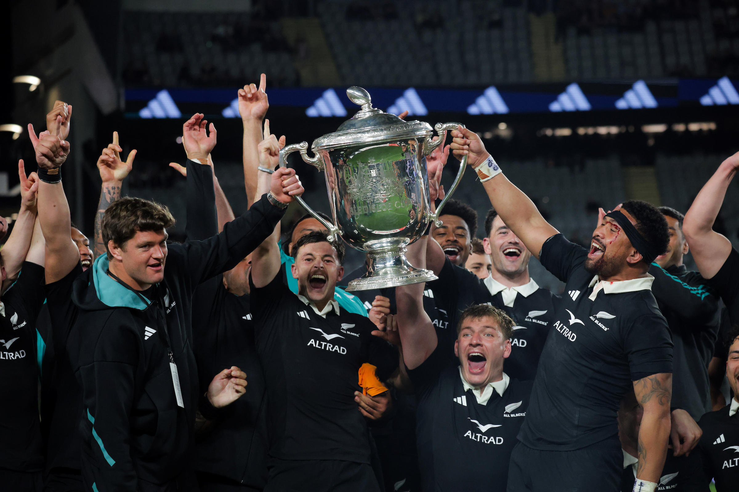 All Blacks celebrate winning the Bledisloe Cup against Australia