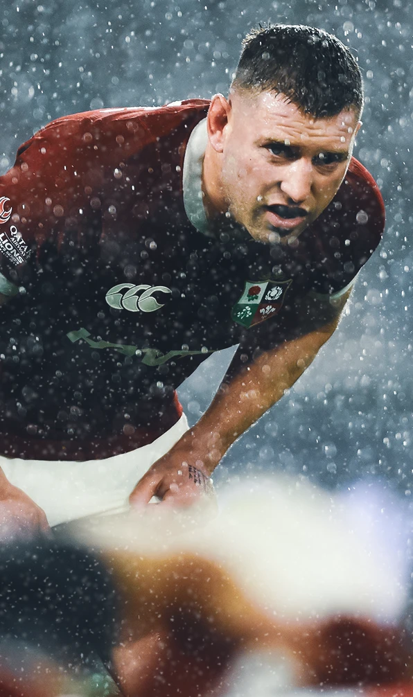 Scotland rugby player Finn Russell peers through the snow in the third British & Irish Lions test match of 2025