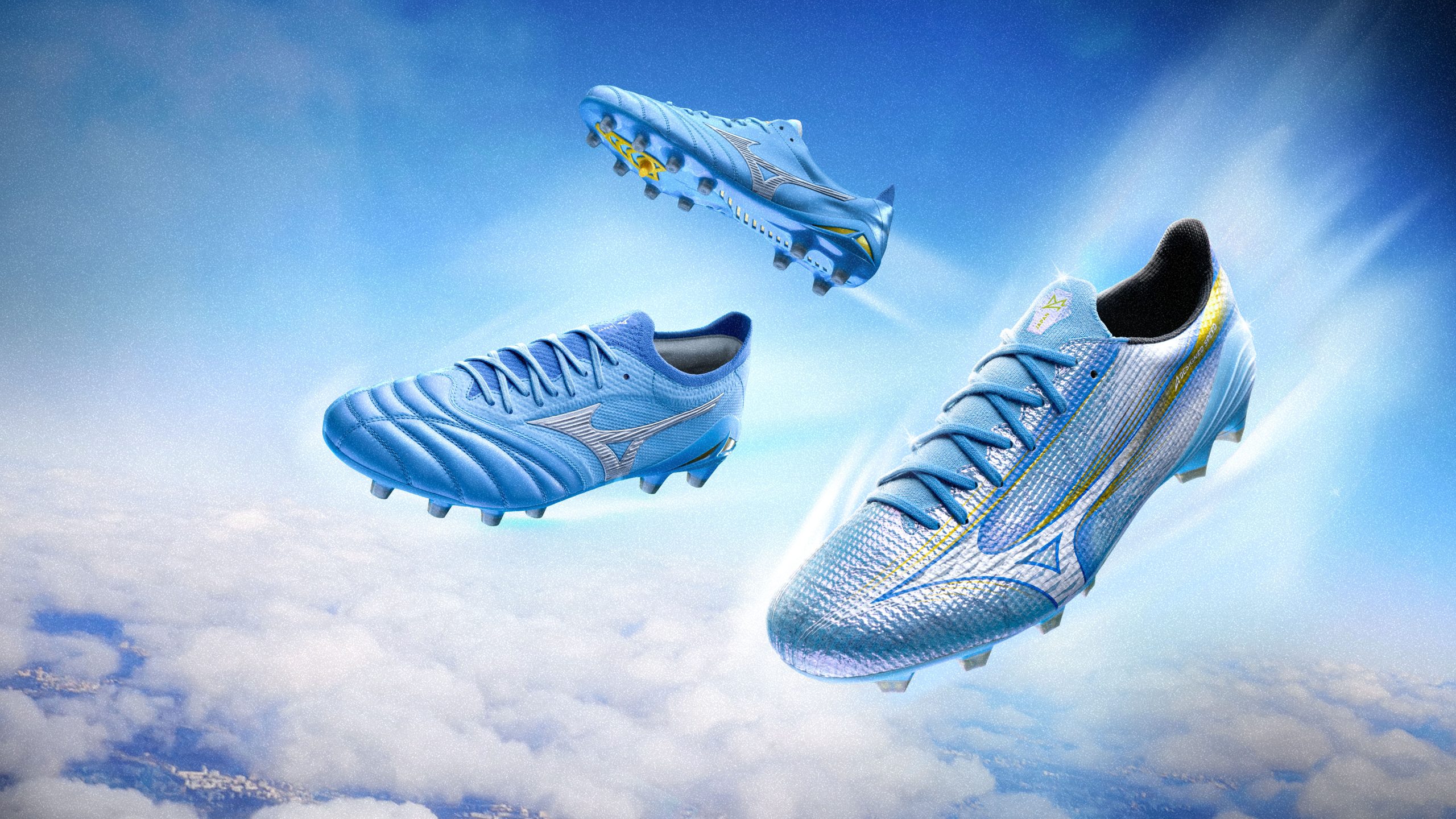 Mizuno Unity Sky Pack Image of blue Mizuno Unity Sky boots flying in the sky