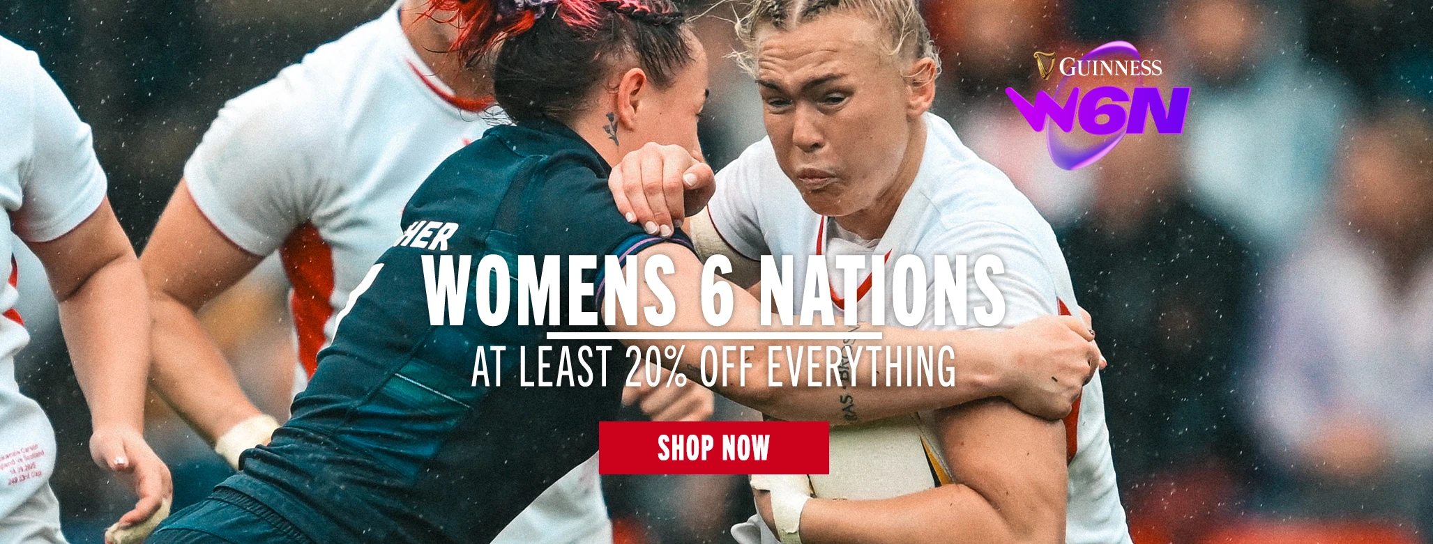 An England Womens Red Roses player is tackled by a Scotland womens player in the Womens 6 Nations tournament.