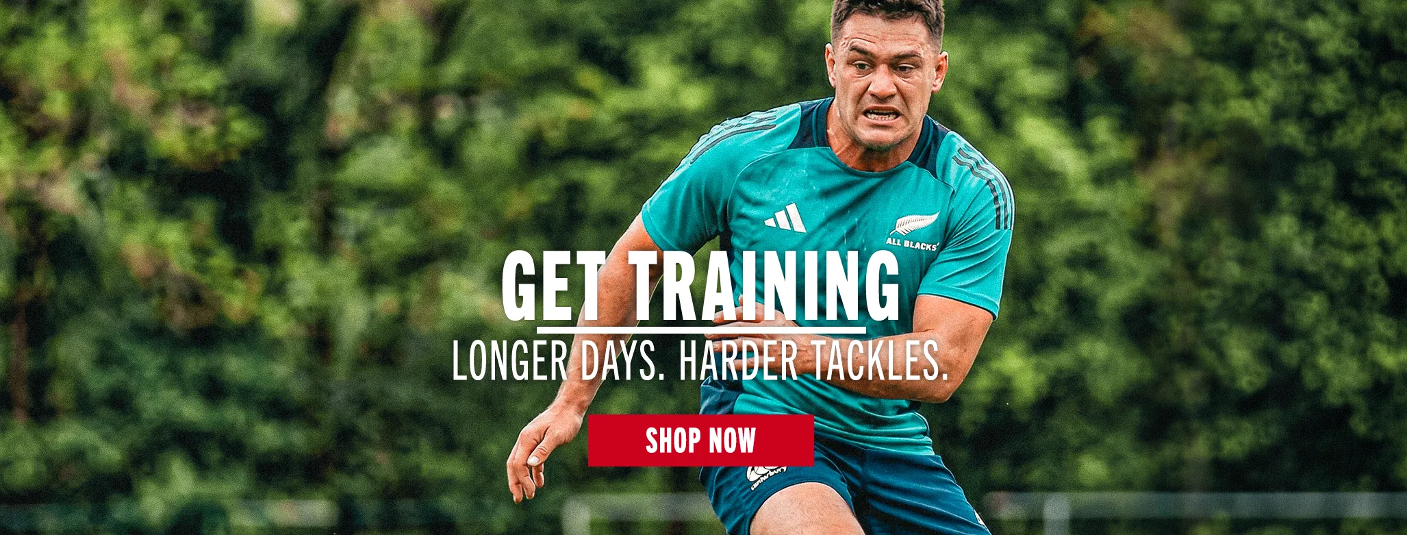 A rugby player practices drill alone on a quiet rugby pitch. He is practicing his sidestep while wearing an All Blacks training t-short and Canterbury shorts.