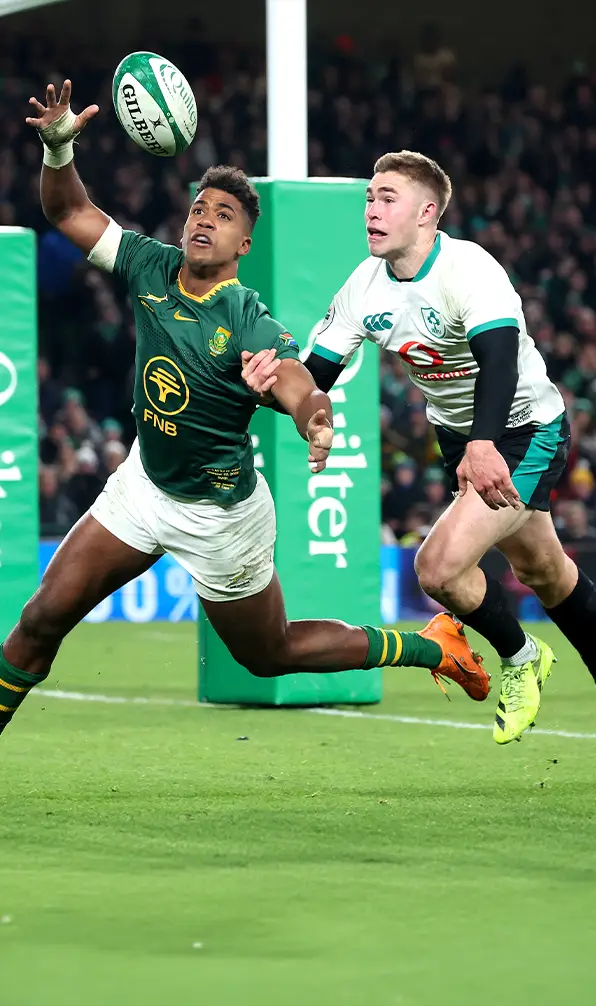 Players clash as they try to claim the ball in the try zone in Ireland's 2025 home game against South Africa