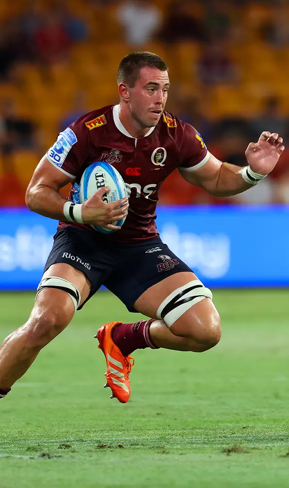 Reds' Joe Brial in action during the 2026 Super Rugby Pacific rugby match between the Reds and Highlanders at Suncorp Stadium in Brisbane, Australia.