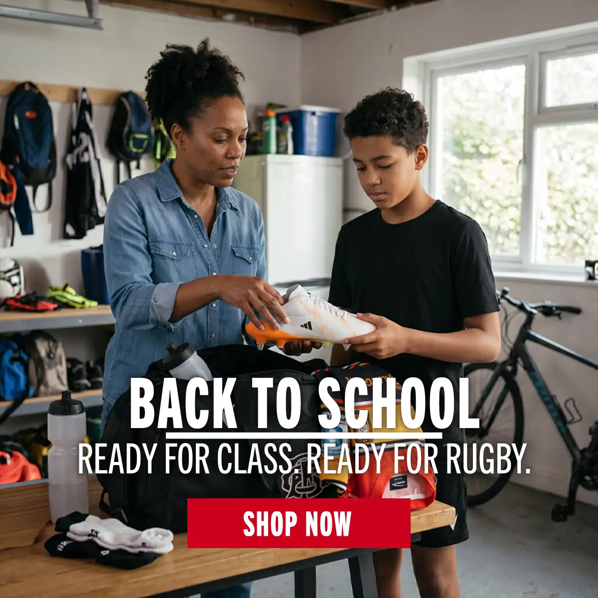 A mum is helping her son get his new rugby kit together for the school year ahead.