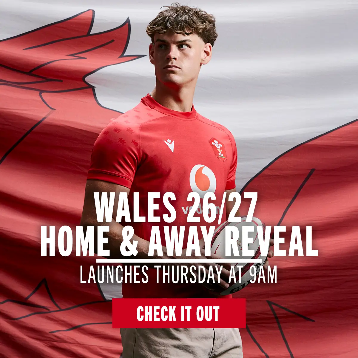 Wales 26/27 Home & Away Reveal Eddie James stands in the new Wales home rugby shirt.