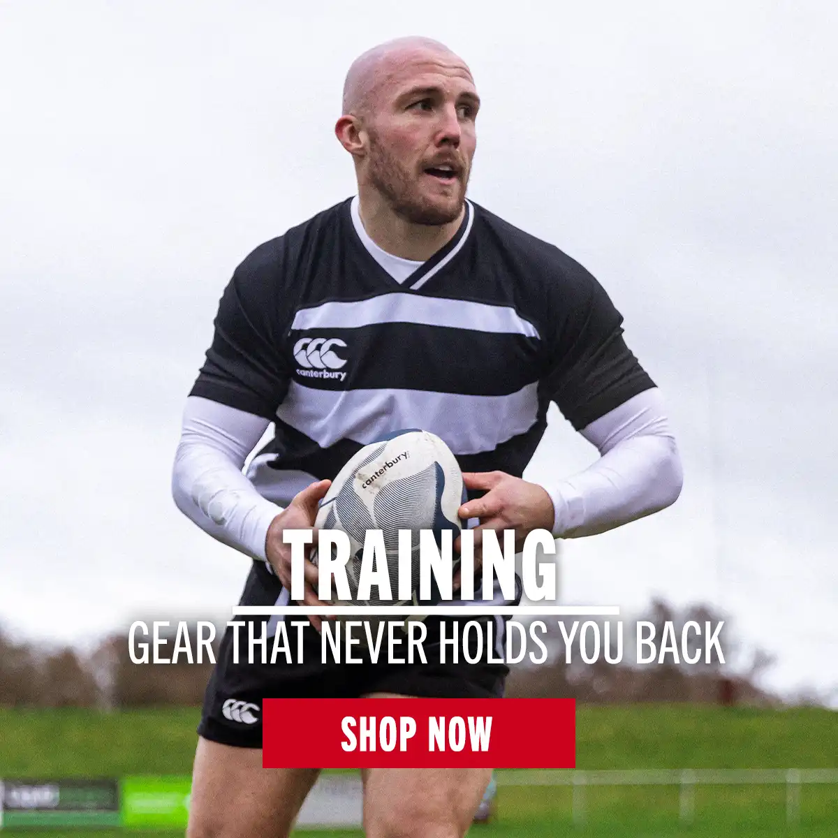Shop Training A player is carrying the ball in training in his new training kit.