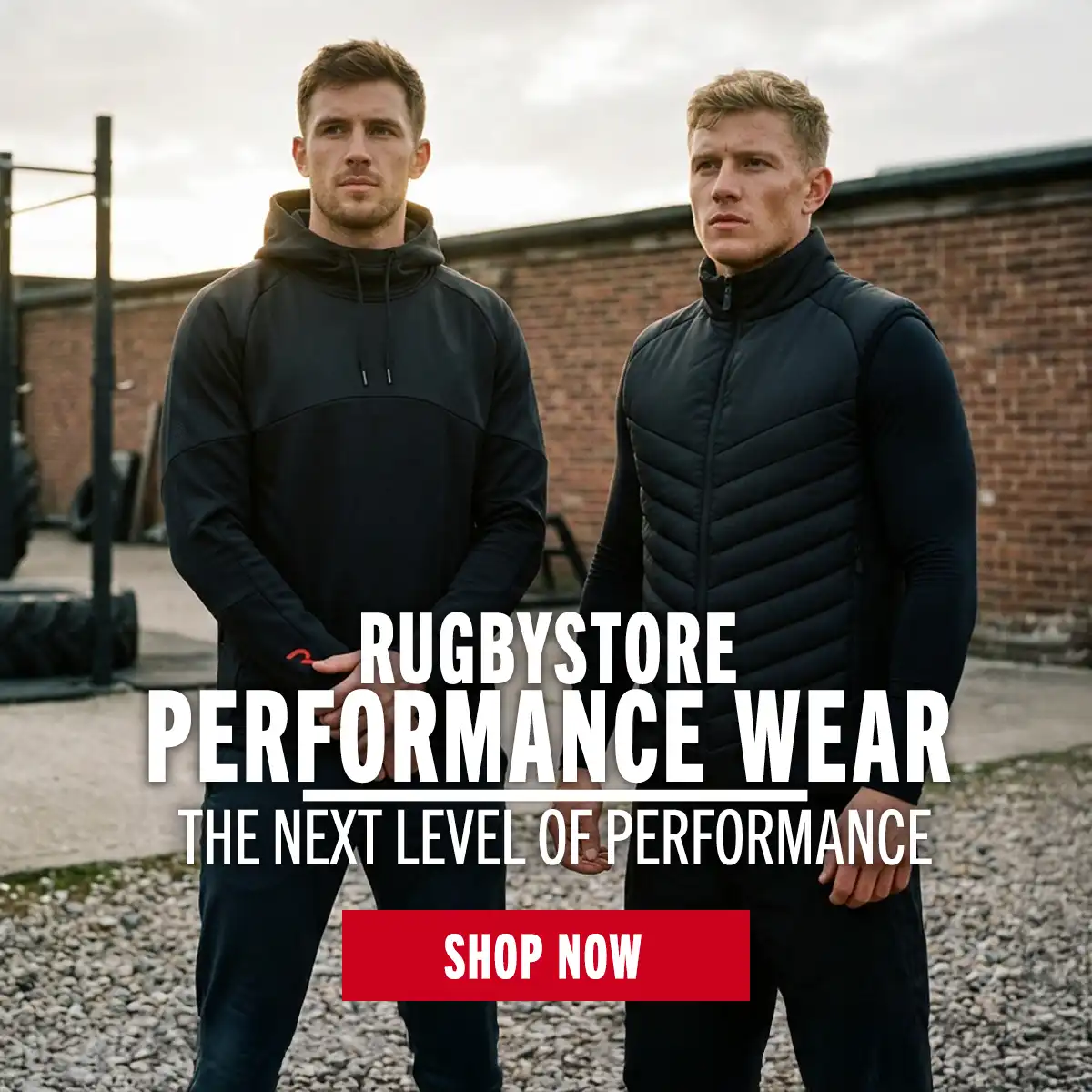 Rugbystore Performance Two mens stand at an outdoor training area in the new Rugbystore Performance wear.